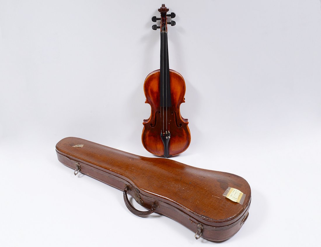 CONTINENTAL VIOLIN: Bears label Johann George Lippold 1898. Length of back 14 1/4". In case. (Cond: bridge missing, considerable wear and fading) (300/400)