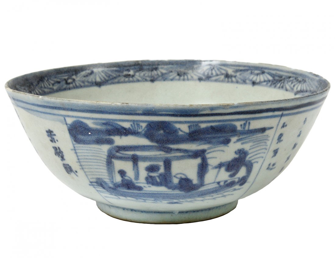 MING BLUE AND WHITE PORCELAIN CALLIGRAPHY BOWL: Chinese. Ming Dynasty. 1368-1644. Signed in the interior. The exterior with rows of calligraphy and a sampan. Diameter 6 5/8". (Cond: minor chips to glaze) (500/700) Note: salvaged in 1984 in the Sout