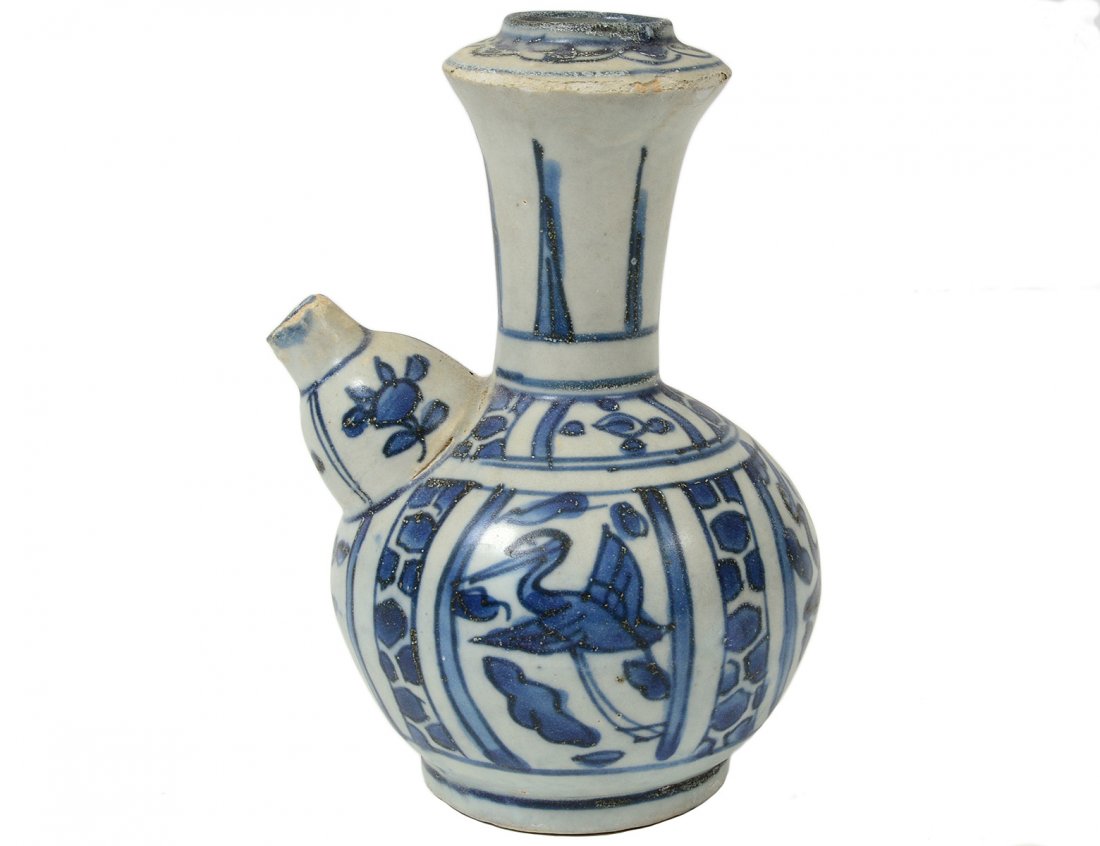 MING BLUE AND WHITE PORCELAIN WINE VESSEL: Chinese. Ming Dynasty. 1368-1644. Height 5 1/8". (Cond: minor chips to glaze) (300/400) Note: salvaged in 1984 in the South China Sea by Michael Hatacher