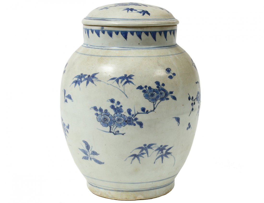 MING BLUE AND WHITE PORCELAIN JAR AND COVER: Chinese. Ming Dynasty. 1368-1644. Height 10 3/4". (800/1200) Note: salvaged in 1984 in the South China Sea by Michael Hatacher