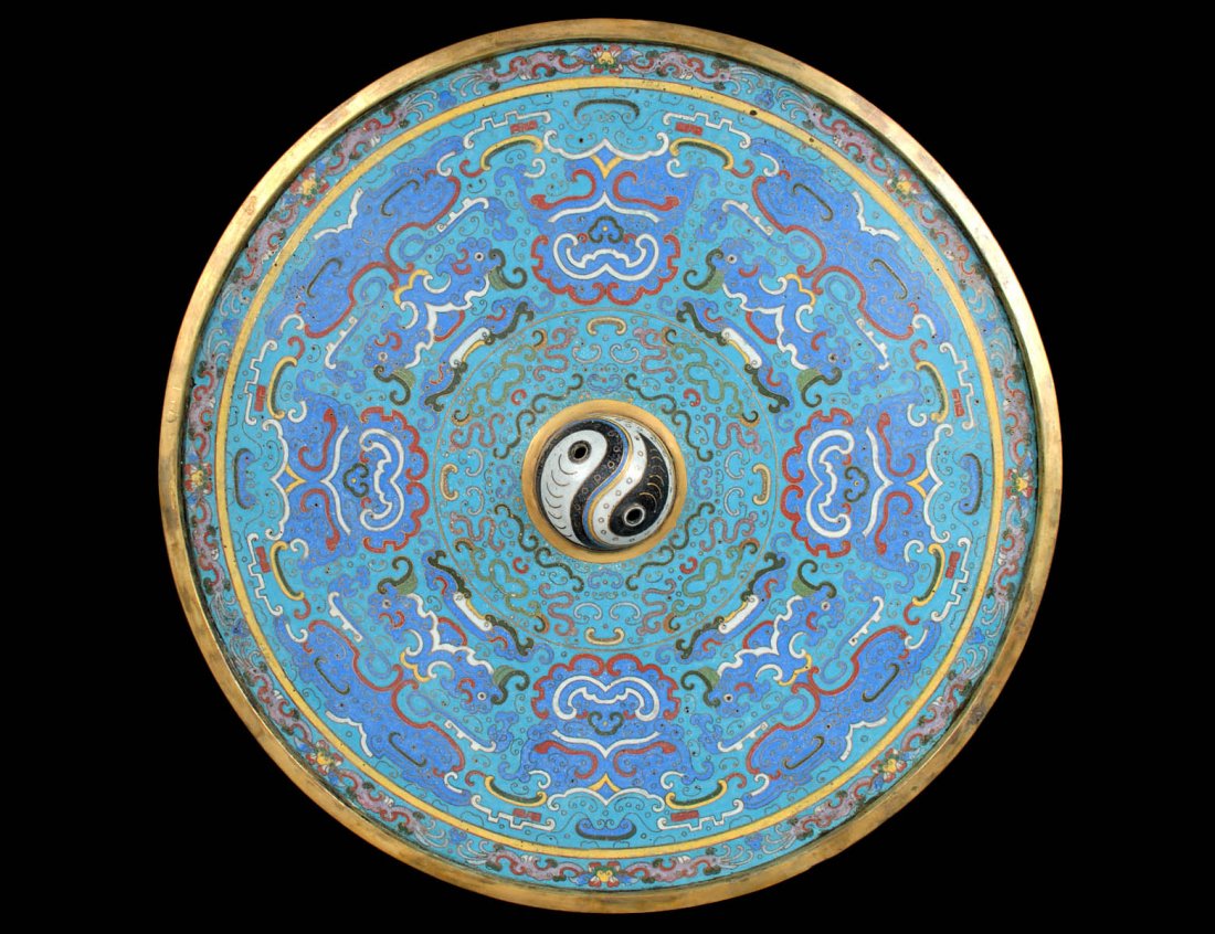 GOOD CLOISONNE ENAMEL MIRROR: Chinese. The large disk centered by a Taoist yin-yang button. Diameter 14 1/8". (4000/6000)