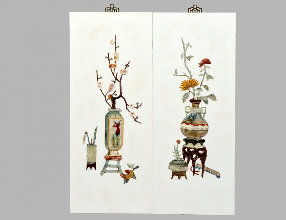 PAIR OF SOAPSTONE OVERLAID PANELS: Chinese. Each depicting vases with flowering branches. Measuring 34" by 14". (150/200)