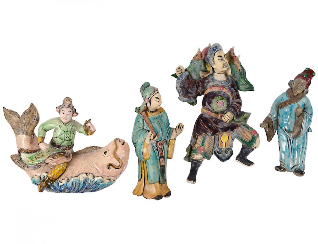 GROUP OF FOUR POLYCHROMED POTTERY WALL FIGURES (1 of 9)