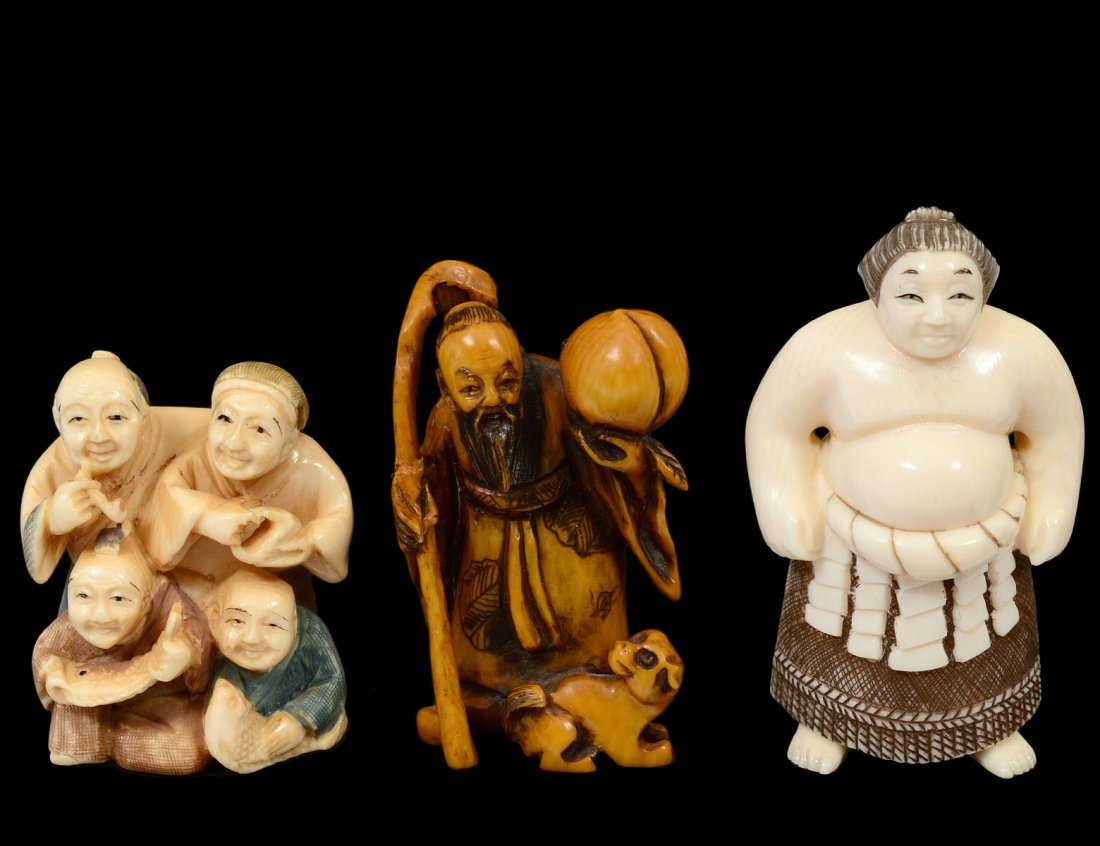 GROUP OF THREE CARVED IVORY NETSUKES (1 of 7)