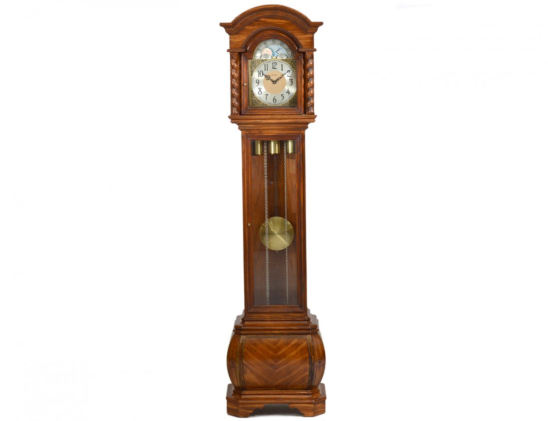 GRANDFATHER CLOCK: Made by Herschede. Height 80”. Width 16 1/2”. Depth 10”. (Cond: good) (300/400)