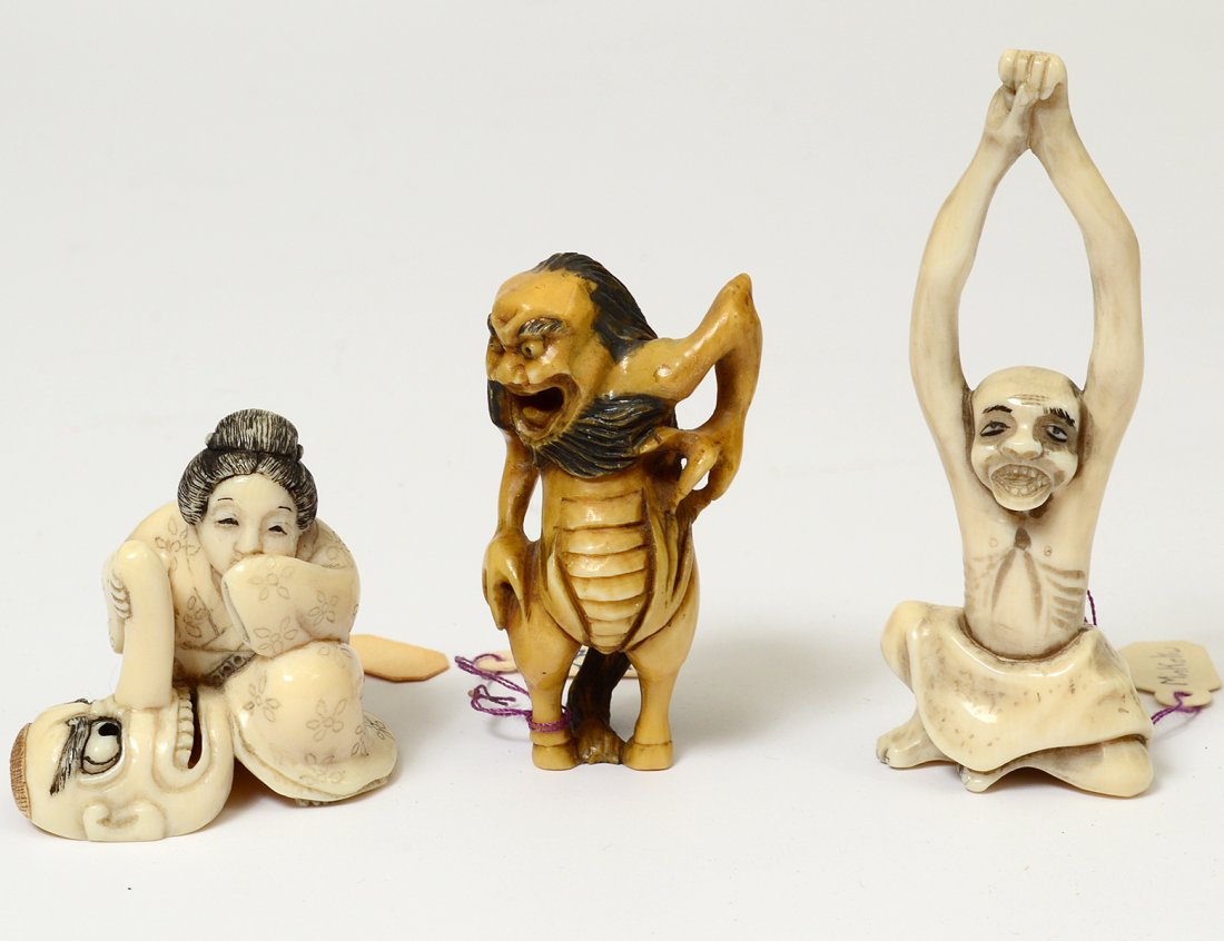THREE CARVED IVORY NETSUKES (1 of 6)