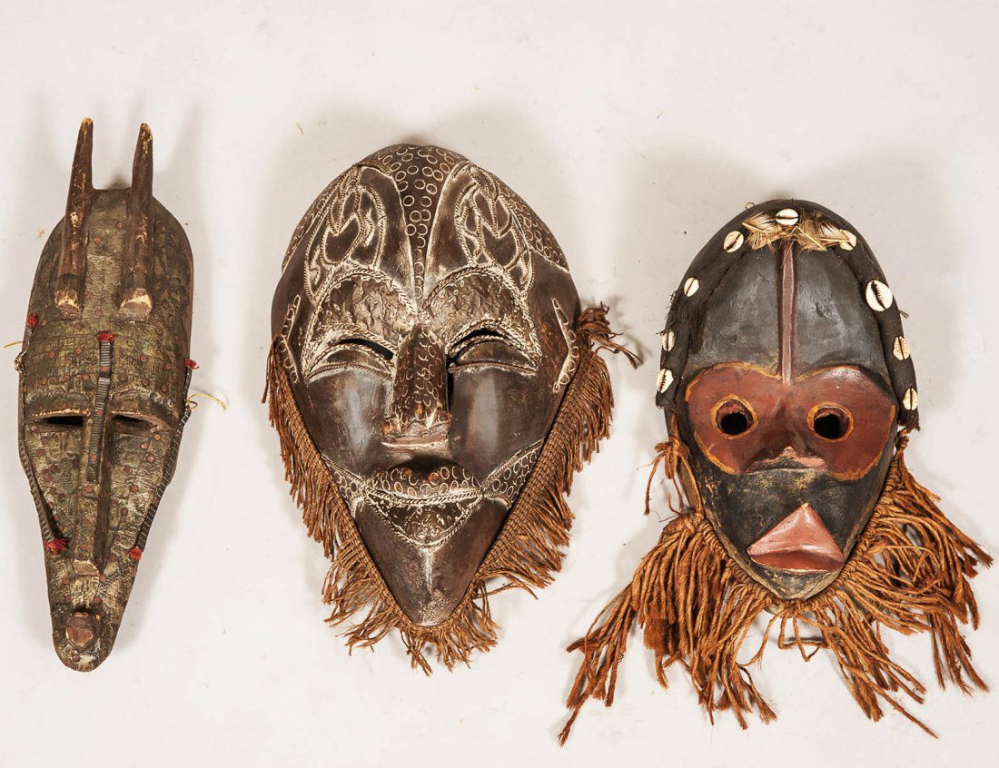 GROUP OF THREE AFRICAN TRIBAL MASKS (1 of 4)