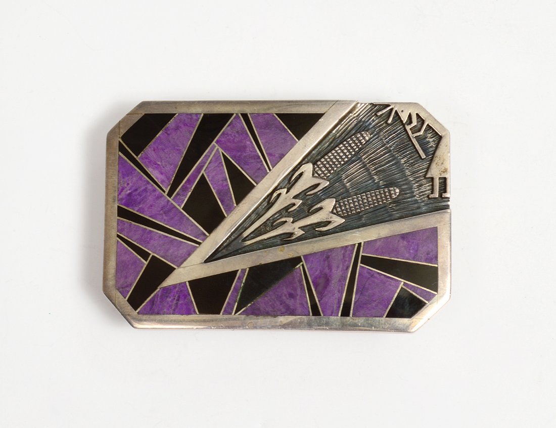 NATIVE AMERICAN STERLING SIVLER BELT BUCKLE: Marked sterling. Initialed V. Inlay work of jet and sugilite. Stampwork. (2.57 oz) (Cond: good) (300/400)