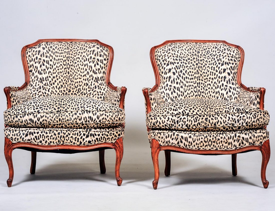 PAIR OF LOUIS XV STYLE BERGERES: Each upholstered in leopard print. (300/400)