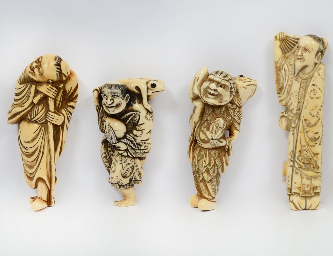 GROUP OF FOUR IVORY NETSUKES (1 of 2)