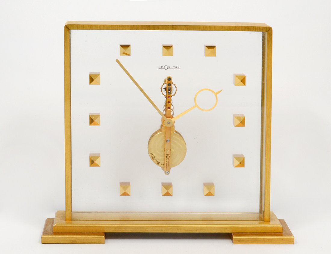 LE COULTRE BRASS AND GLASS DESK CLOCK: Swiss. Case No. 333. Height 7 5/8". (300/400)