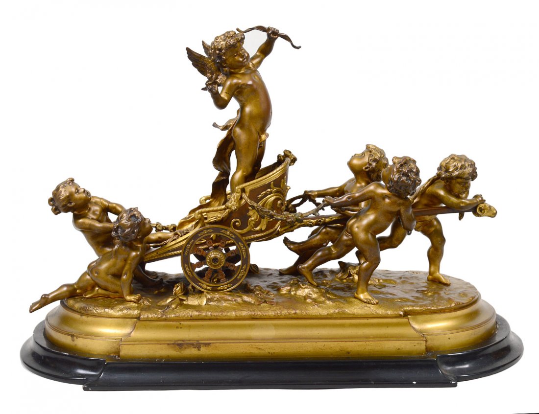 LOUIS GOSSIN (French. 1846-1928): "Puttis Pulling a Chariot". Signed and with Paris foundry stamp. Gilt Bronze. Length 19 1/2". With a black painted base. (4000/5000)
