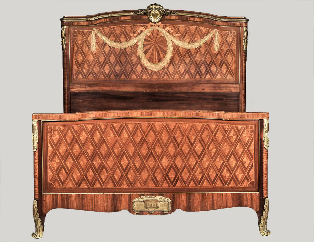 LOUIS XVI STYLE MARQUETRY BEDSTED: Comprising: headboard, footboard and rails. With gilt bronze mounts. Width 63". (500/700)