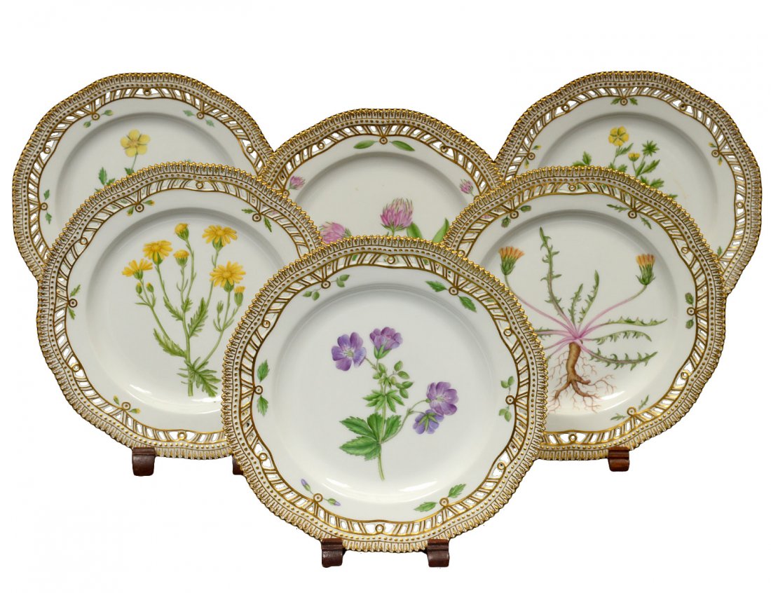SET OF SIX FLORA DANICA RETICULATED PORCELAIN PLATES: Danish. Post War. By Royal Copenhagen. Each with black botanical identification, 20-3554, and with green and blue factory marks. Diameter 9". (1800/2400)