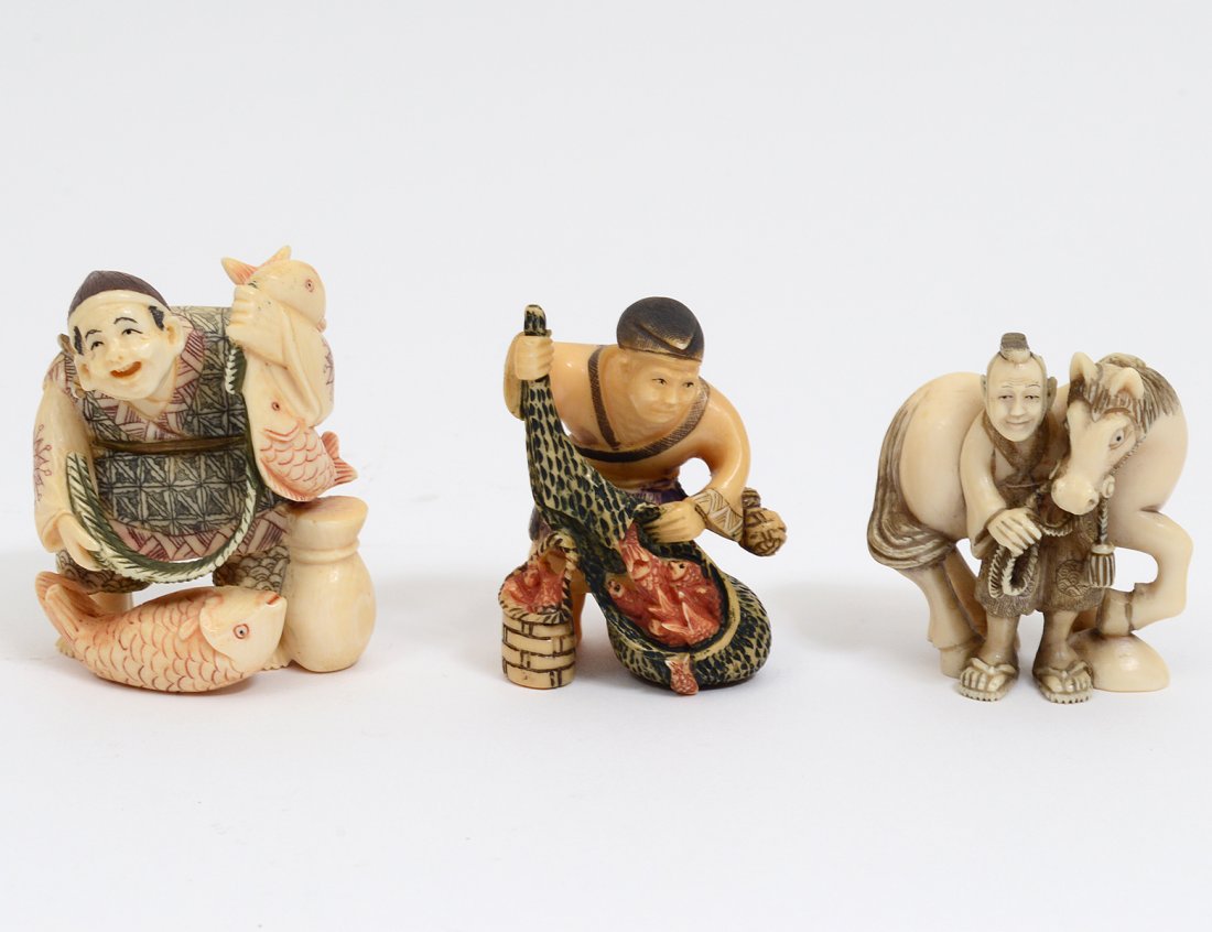 GROUP OF THREE CARVED IVORY STUDIES (1 of 8)