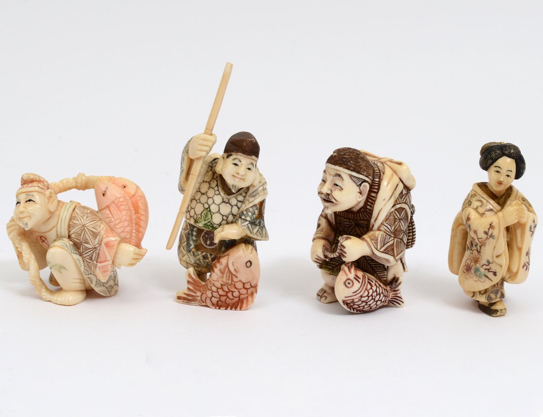 GROUP OF FOUR CARVED IVORY NETSUKES (1 of 7)