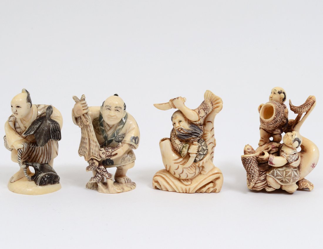 GROUP OF FOUR CARVED IVORY NETSUKES (1 of 7)
