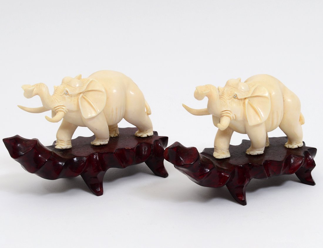 TWO CARVED IVORY ELEPHANTS (1 of 5)
