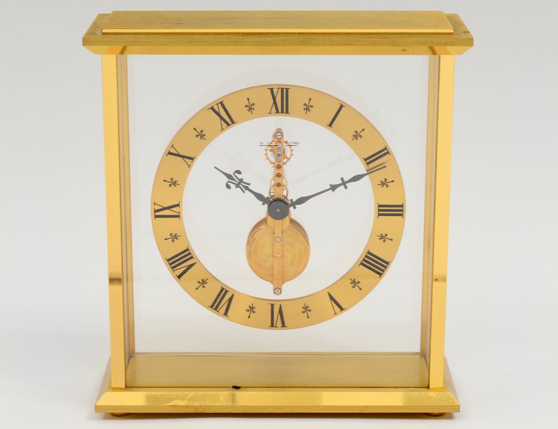 LE COULTRE BRONZE AND GLASS DESK CLOCK: Swiss. Height 6 1/2". (300/500)
