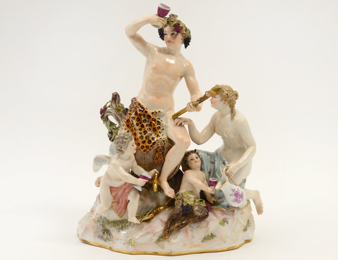 MEISSEN PORCELAIN BACHANAL GROUP: German. 19th Century. Incised C35, Gilt 62 and underglaze blue crossed swords. Height 12". (Cond: losses and damages) (600/800)
