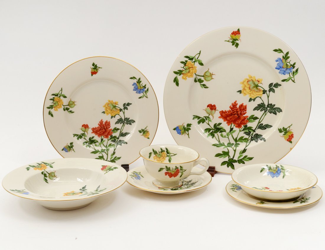 EIGHTY-TWO PIECE CASELTON PORCELAIN PART DINNER SERVICE: American. Comprising: twelve dinner plates, eleven salad plates, twelve soup plates, twelve bread and butter plates, eleven berry bowls, twelve cups and saucers. (Cond: minor chips) (500/700)