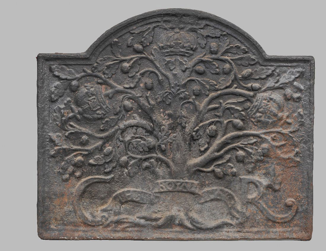 CAST IRON FIREBACK: With a fruit design. Measuring 29" by 35". (200/300)