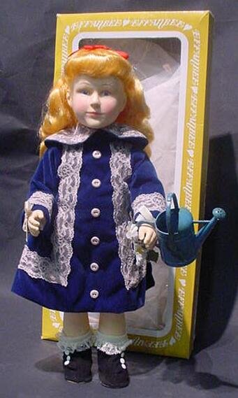 1981 Effanbee "A Girl with a Watering Can" Doll.: 1981 Effanbee "A Girl with a Watering Can" Doll. From The Limited Edition Doll Club. Comes with Original Box, and Paperwork. Mint Condition. Measures 14-1/2 Inches Tall. Shipping $15.00