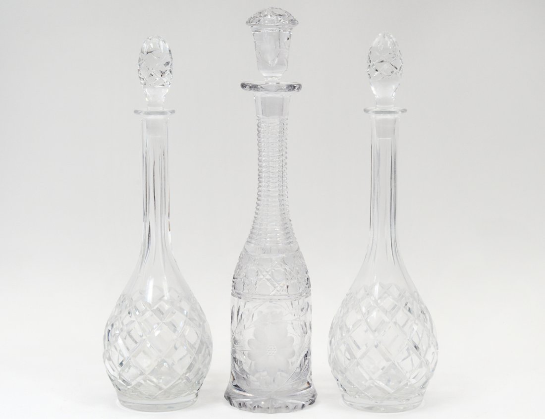 GROUP OF THREE CUT GLASS DECANTERS (1 of 4)