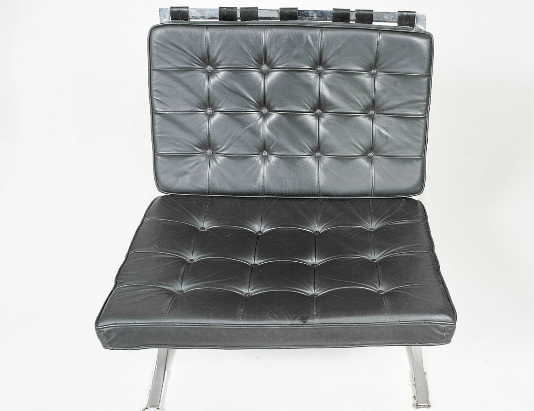 KNOLL BARCELONA CHAIR: Designed by Ludwig Mies van der Rohe. With black leather cushions. Length 29 1/2". (250/300)
