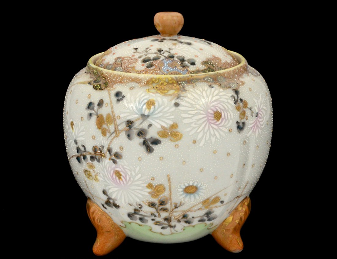 NIPPON PORCELAIN JAR AND COVER: Japanese. First half of the 20th Century. Decorated with raised enamels. Height 6 1/2". (50/100)