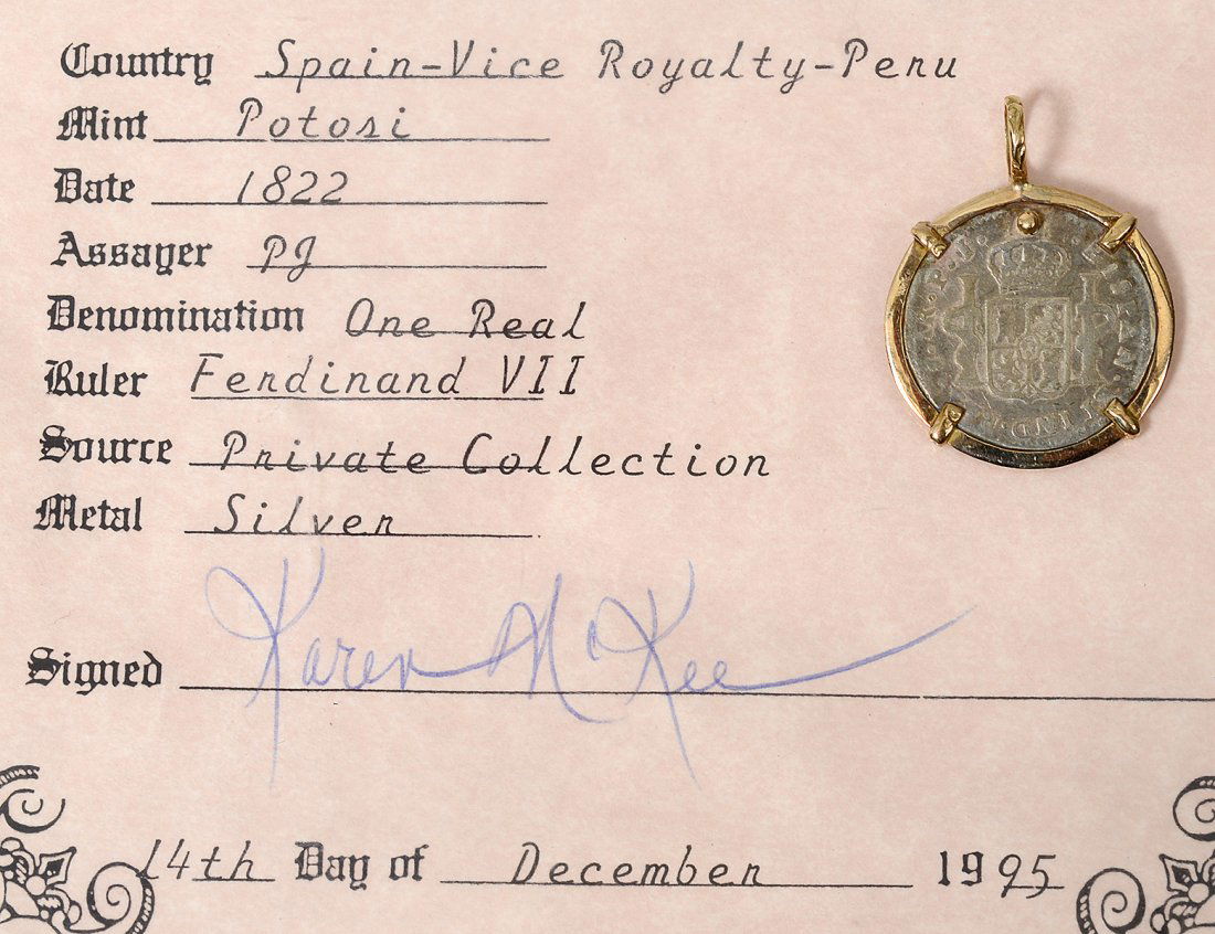 SPANISH SILVER COIN IN PENDANT MOUNTING (1 of 3)