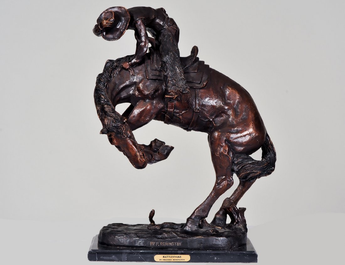 AFTER FREDERIC REMINGTON (American. 1861-1909): "The Rattlesnake". Signed. Bronze. Height 23". (Cond: good) (600/800)