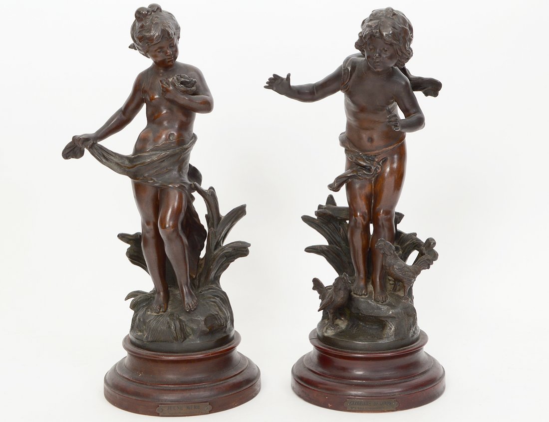 TWO PATINATED WHITE METAL SCULPTURES: After Auguste Moreau (French. 1834-1917) Titled "Jeune Mere" and "Combats de Cogs". Both signed and inscribed France. In wood socket bases. Height of tallest 16". (Cond: good) (250/350)