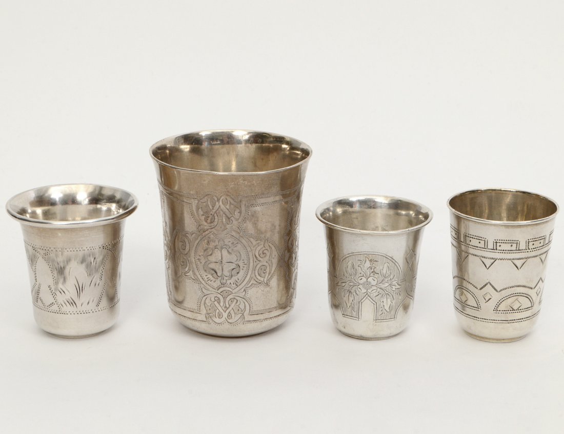GROUP OF FOUR RUSSIAN SILVER BEAKERS: Height of tallest 2 1/2”. 4.3 troy ounces. (Cond: good) (100/150)