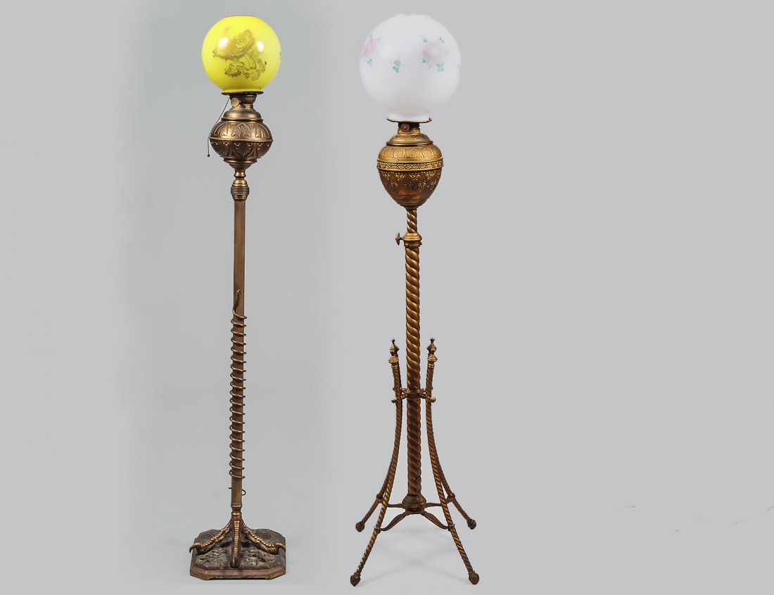 TWO SIMILAR AMERICAN BRASS PIANO FLOOR LAMPS: Late 19th Century. One marked Imperial, Patent Aug 19,1889. The second, Success. The first with a standard ending in a claw. The second with four curved supports. Heights 54", 49", respectively. (150/