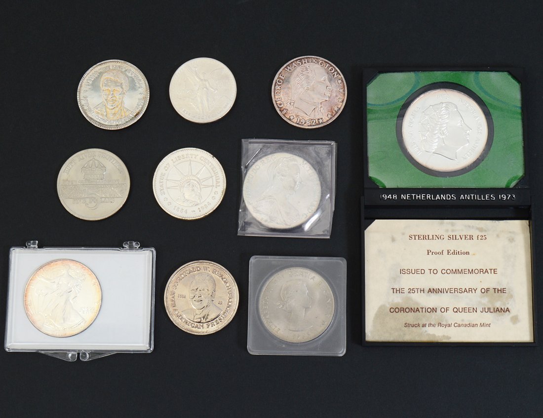 GROUP OF TEN COINS: Comprising: 1992 1 ounce silver dollar, 1982 Mexican silver coin, Maria Theresia Austria coin, 1982 George Washington 1 ounce coin, 1973 Queen Juliana silver coin, 1984 100th anniversary Statue of Lib