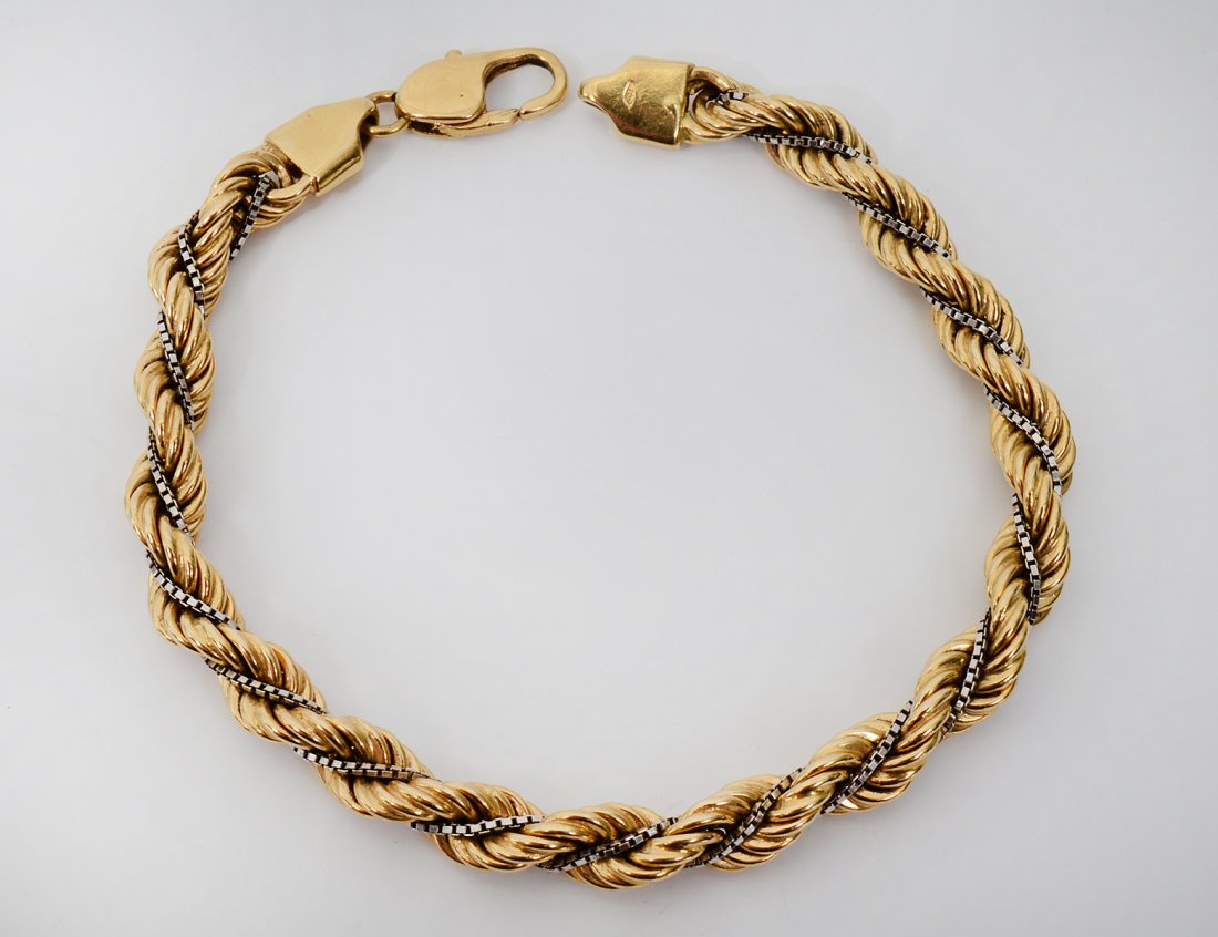 GOLD ROPE CHAIN BRACELET: Stamped 750 on clasp. Lobster claw clasp. Length 8”. 10.0 dwt. (Cond: good) (250/350)