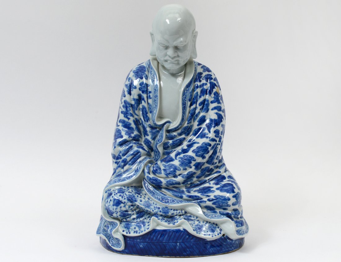 BLUE AND WHITE PORCELAIN FIGURE OF A PRAYING MONK (1 of 6)