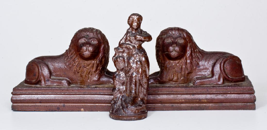 Three Sewer Tile Figures, Ohio origin, late 19th or: Three Sewer Tile Figures, Ohio origin, late 19th or early 20th century, a pair of lion-on-base doorstops, together with a small statue of Rebecca-at-the-Well. Provenance: A fresh-to-the-market group f