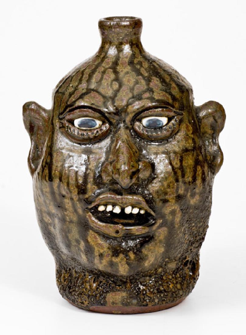 Lanier Meaders Stoneware Face Jug, Cleveland, Georgia: Alkaline-Glazed Stoneware Face Jug, Signed "Lanier Meaders", Cleveland, GA origin, circa 1980, ovoid jug with hand-modeled and applied face, including kaolin eyes with cobalt-decorated pupils, pointed