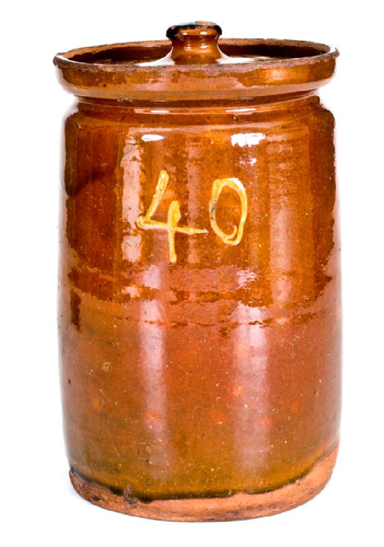 Rare Numbered Redware Apothecary Jar (40), attrib.: Scarce Slip-Decorated Redware Apothecary Jar with Lid, Inscribed "40", attributed to Nathaniel Seymour, East Hartford, CT, late 18th or early 19th century, cylindrical jar with tooled shoulder and sli