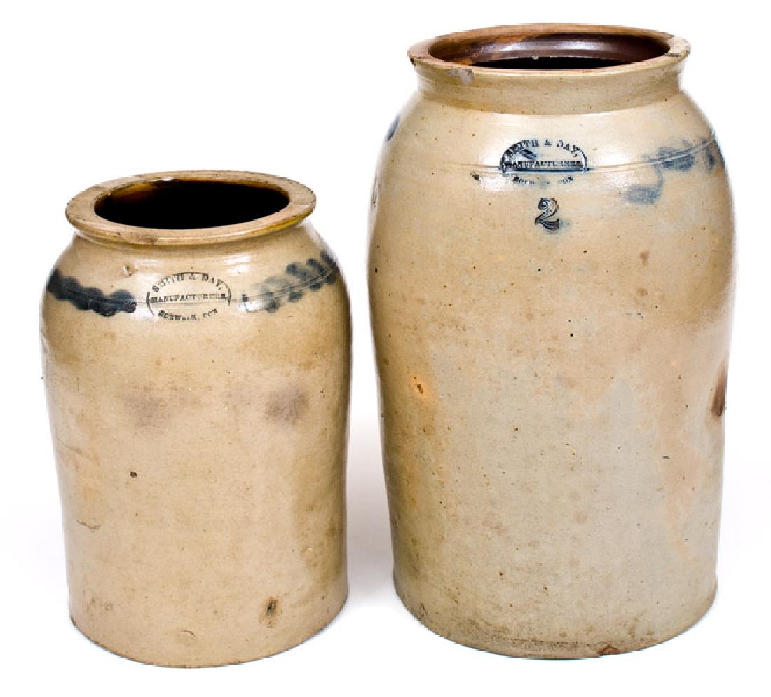Lot of Two: SMITH & DAY, / MANUFACTURERS, / NORWALK CON: Two Cobalt-Decorated Stoneware Jars, Stamped "SMITH & DAY, / MANUFACTURERS, / NORWALK, CON", circa 1840, both of cylindrical form with tooled shoulder, featuring brushed wavy line decoration and cobal