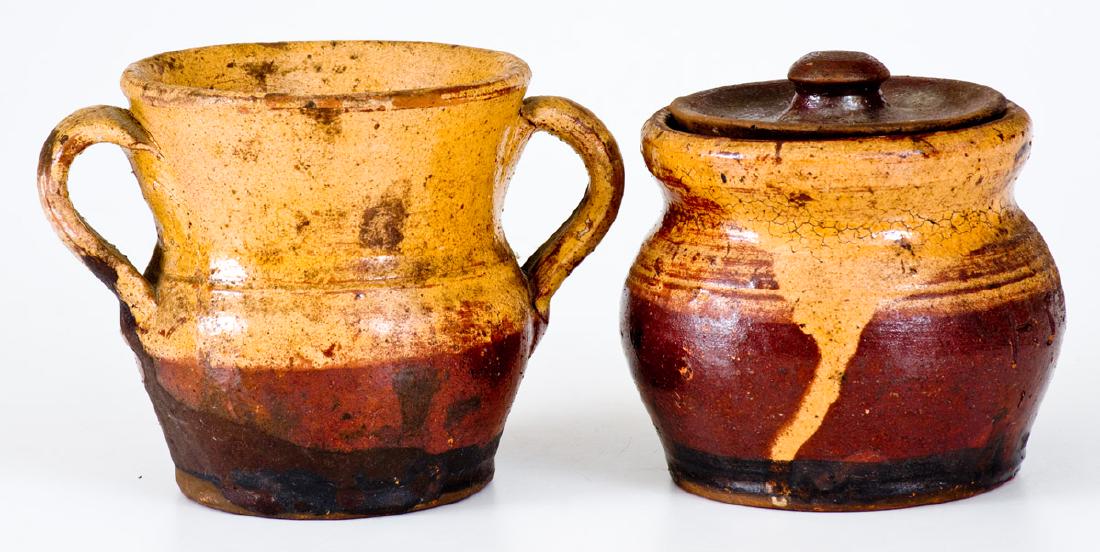 Lot of Two: Henry Schofield (Cecil County, MD) Redware: Two Pieces of Slip-Decorated Redware, Incised "H S", Henry Schofield, Cecil County, MD, circa 1930, an ovoid sugar bowl with original glazed lid and an open-handled vase, both with dipped yellow slip