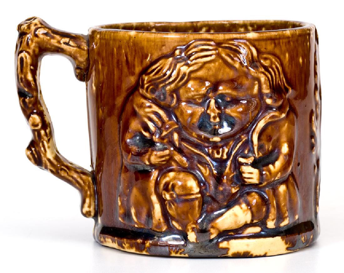 Rare Signed Rockingham Toby Mug probably Charles Coxon,: Rare Signed Rockingham Toby Mug, probably Charles Coxon, South Amboy, NJ, circa 1858-1860, cylindrical mug with relief decoration of a portly man on front and reverse, separated by an acanthus leaf mo