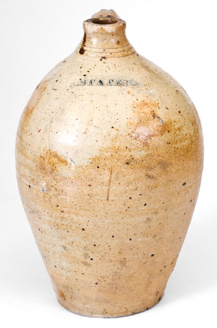 A. States (Stonington, Connecticut) Stoneware Jug: One-Gallon Stoneware Jug, Stamped "A. STATES", Adam States II, Stonington, CT origin, first quarter 19th century, ovoid jug with footed base, tooled spout, and ribbed handle, featuring cobalt highligh