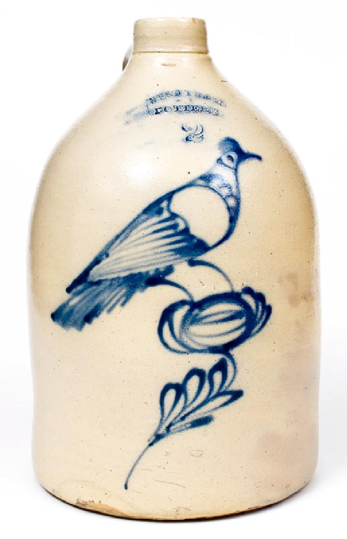 2 Gal. WEST TROY POTTERY Stoneware Jug with: Unusual Two-Gallon Stoneware Jug with Cobalt Bird-on-Flower Decoration, Stamped "WEST TROY / N Y / POTTERY", circa 1875, cylindrical jug with tooled spout, decorated with a slip-trailed design of a cr