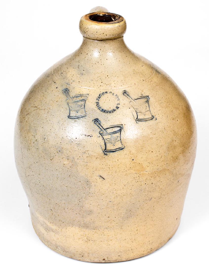Unusual JACOB CAIRE / PO'KEEPSIE, NY Jug w/ Impressed: Unusual Two-Gallon Stoneware Jug with Impressed Mortar and Pestal Motif, Stamped "JACOB CAIRE / PO'KEEPSIE N Y", circa 1849-1852, ovoid jar with tooled shoulder and semi-rounded spout, decorated with