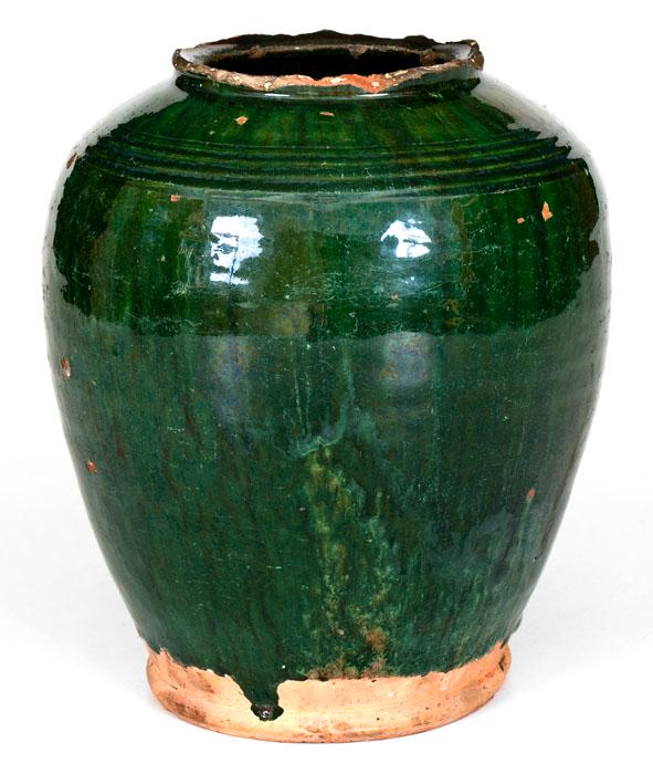 Rare Copper-Glazed Redware Jar, Bristol County, MA: Rare Copper-Glazed Redware Jar, Bristol County, MA origin, late 18th or early 19th century, ovoid jar with footed base and heavily-tooled shoulder, the surface covered in a mottled emerald-green, lead