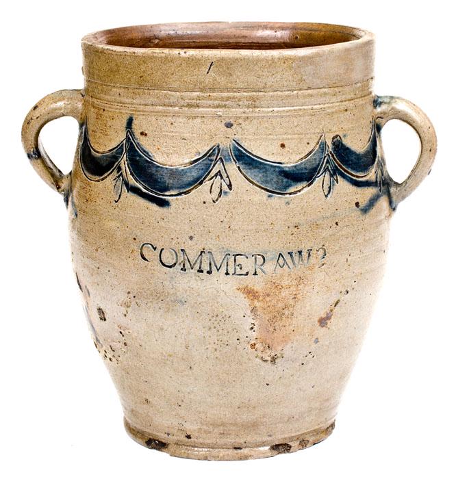 COMMERAWS / STONEWARE Vertical-Handled Stoneware Jar: One-Gallon Stoneware Jar with Impressed Drape-and-Tassel Motif, Stamped "COMMERAWS / STONEWARE", Thomas Commeraw, Manhattan, NY, late 18th or early 19th century, ovoid jar with footed base, heavily-to