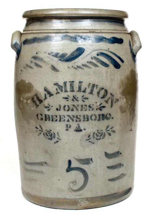 5 Gal. HAMILTON & JONES / GREENSBORO, PA Stoneware Jar: Five-Gallon Cobalt-Decorated Stoneware, Stenciled "HAMILTON / & / JONES, / GREENSBORO. / PA.," circa 1875, cylindrical jar with tooled shoulder, semi-rounded rim, and applied lug handles, decorated at